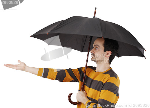 Image of Man with umbrella