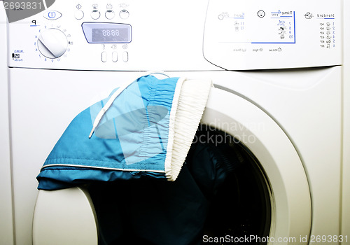 Image of Trousers and laundry.