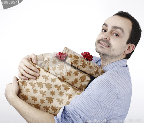 Image of Young man holding a present