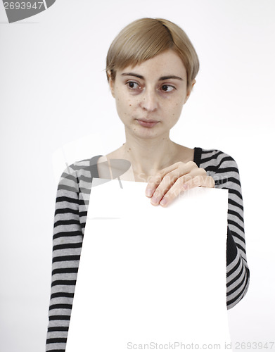 Image of Woman holding a paper