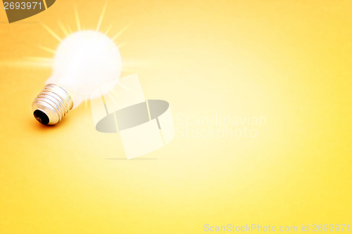 Image of Background with lit lightbulb