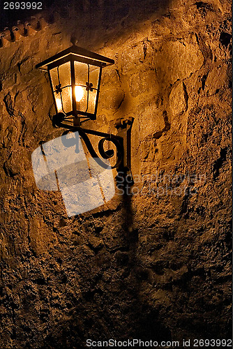 Image of street lamp a bulb in the   wall fussen 