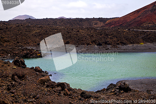 Image of car street people  stone  atlantic ocean sky   in el golfo  spai