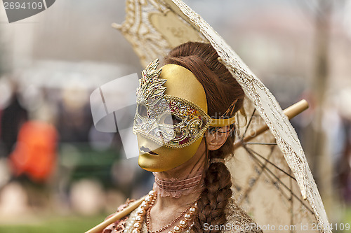 Image of Disguised Person with a Parasol