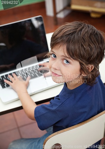 Image of Little Boy With Laptop In Preschool