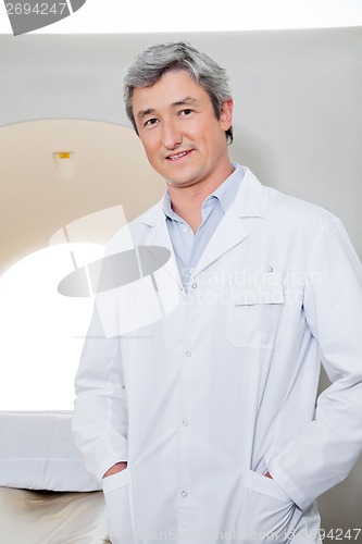 Image of Radiologist Standing With Hands In Pockets