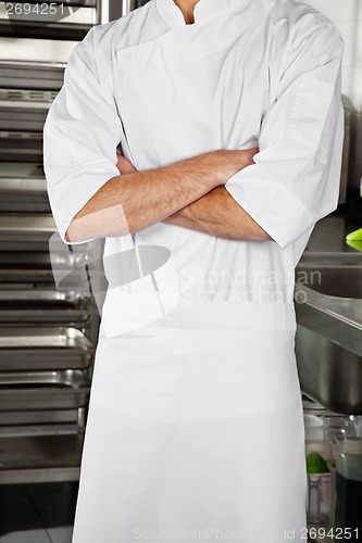 Image of Male Chef Standing With Arms Crossed