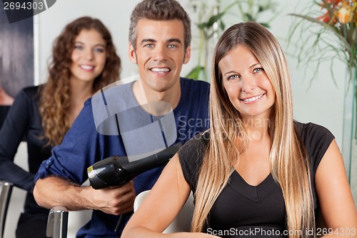 Image of Team Of Hairdressers At Beauty Parlor