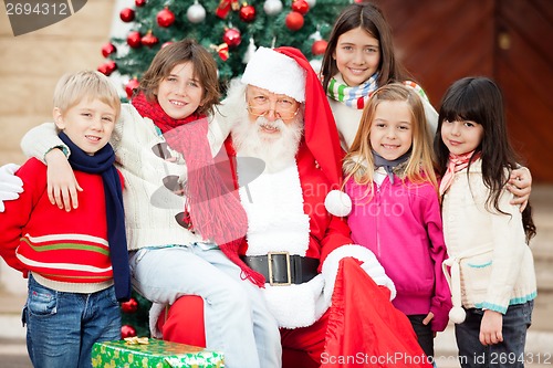 Image of Happy Santa Claus And Children