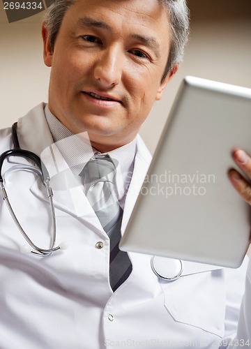 Image of Doctor Holding Digital Tablet