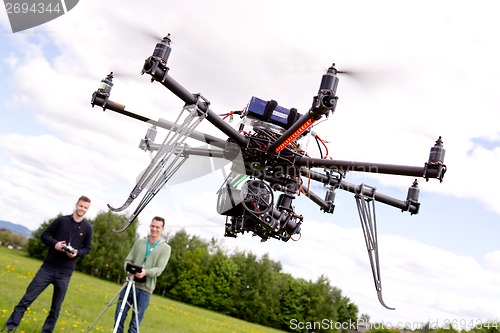Image of Photographer and Pilot with UAV