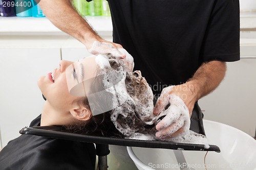 Image of Client Getting Hair Washed By Hairstylist