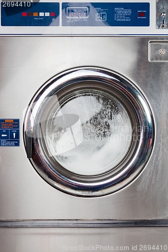 Image of Automatic Washing Machine In Laundromat