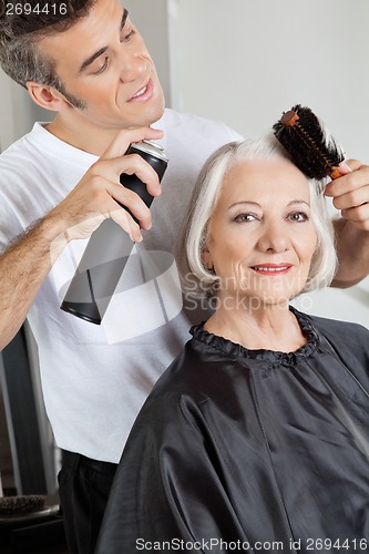 Image of Woman Getting Her Hair Styled
