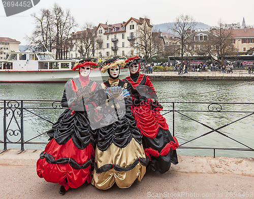 Image of Three Disguised Persons