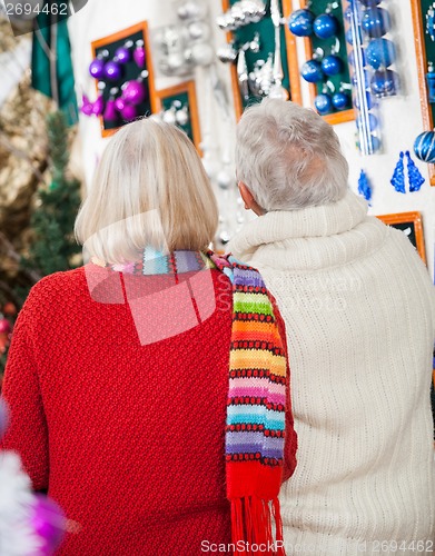 Image of Senior Couple At Christmas Store