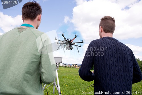 Image of Pilot and Photographer Operating Photography Drone