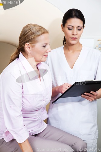 Image of Female Technician With Patient