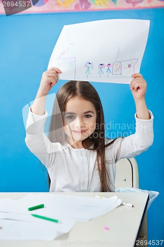 Image of Girl Showing Drawing Paper In Preschool