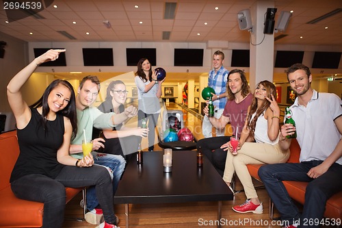 Image of Friends Having Leisure Time in Bowling Club