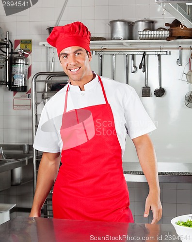 Image of Chef Standing In Commercial Kitchen