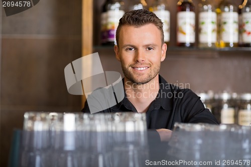 Image of Handsome Male Barista At Coffeeshop