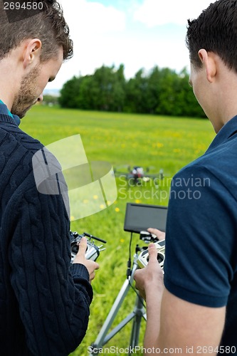 Image of Engineers Operating UAV Helicopter