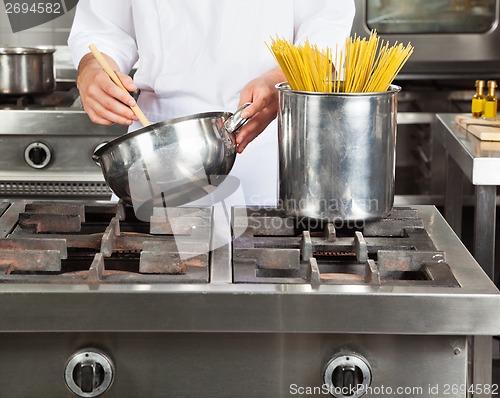 Image of Chef Cooking Spaghetti