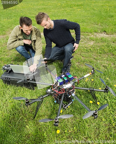 Image of Technicians Discussing UAV