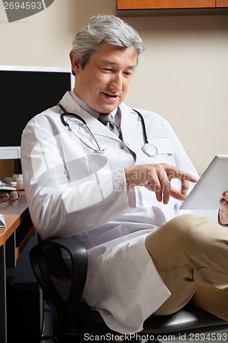 Image of Doctor Using Digital Tablet