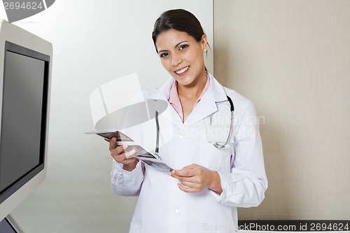 Image of Female Radiologist Holding Sonography Print