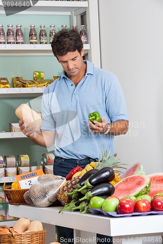 Image of Man Shopping Vegetables In Supermarket