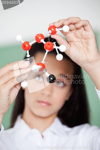 Image of Schoolgirl Analyzing Molecular Structure