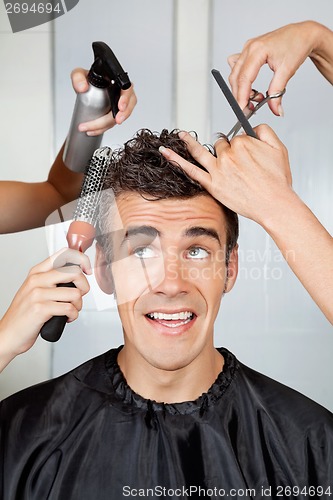 Image of Hairdressers Setting Up Client's Hair