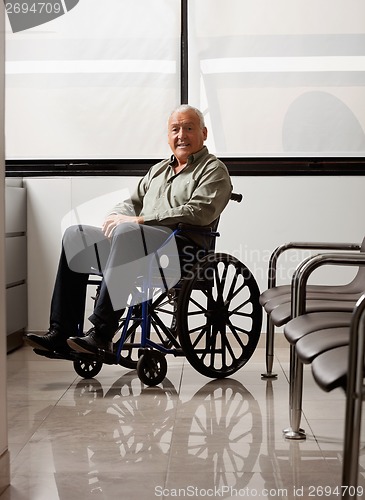 Image of Senior Man On Wheelchair