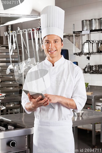 Image of Male Chef With Digital Tablet