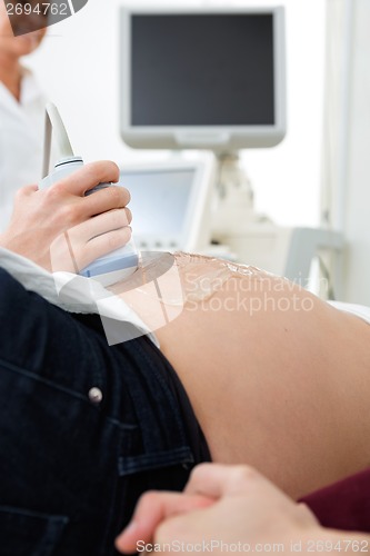 Image of Pregnant Woman Going Through An Ultrasound Scan