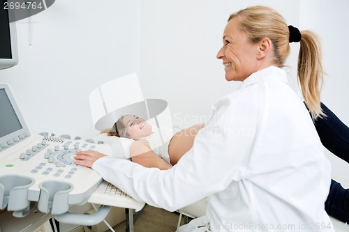 Image of Woman Getting Ultrasound From Doctor