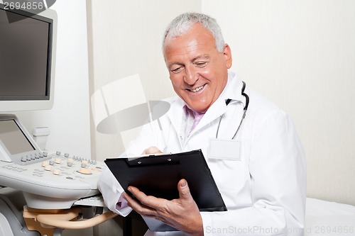 Image of Radiologist Holding Clipboard