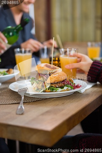 Image of Friends Eating Lunch at Cafe