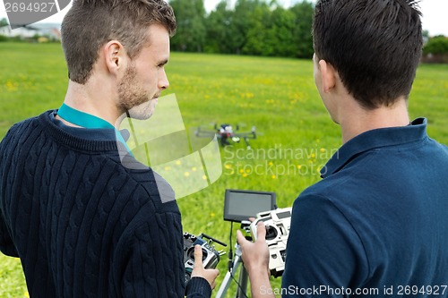 Image of Engineers Operating UAV Octocopter