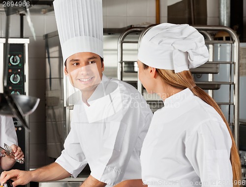 Image of Male Chef With Colleague At Kitchen