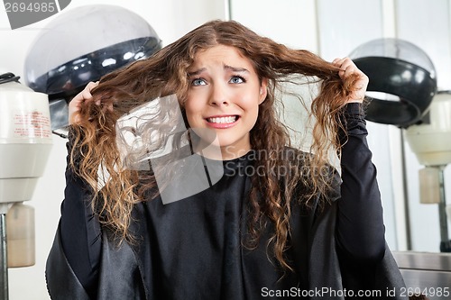 Image of Frustrated Woman Pulling Her Hair