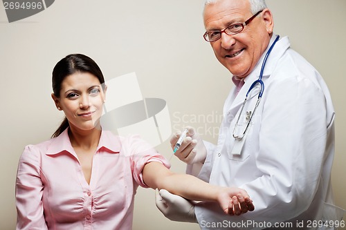 Image of Female Patient Having Blood Test