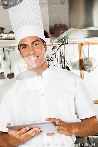 Image of Male Chef With Digital Tablet