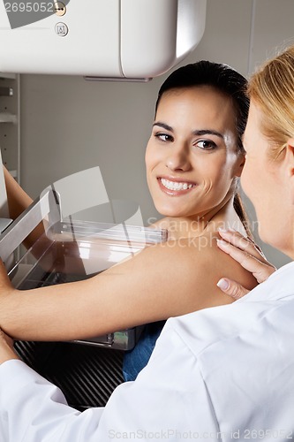 Image of Young Female Patient Undergoing Mammogram X-ray Test