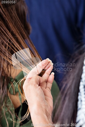 Image of Hairdresser Preparing For Client's Haircut