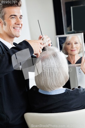 Image of Hairdresser Cutting Client's Hair