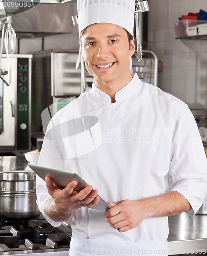 Image of Handsome Chef With Tablet Computer