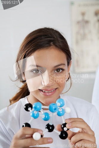 Image of Teenage Schoolgirl With Molecular Structure